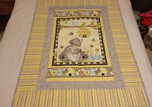 yellow and gray baby quilt